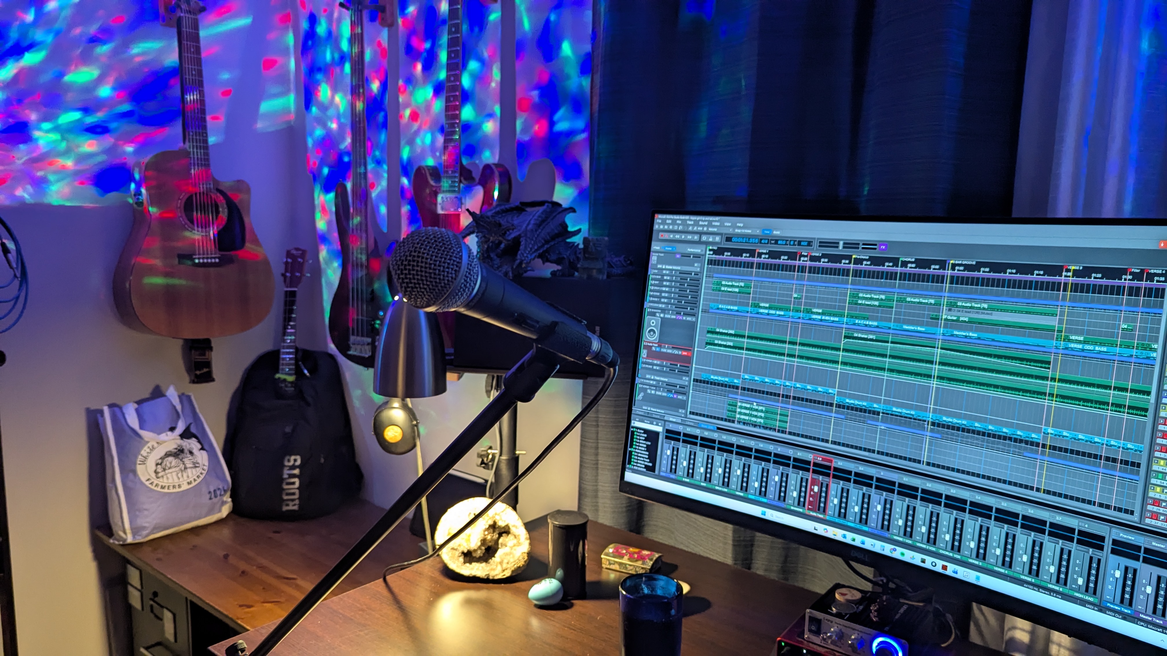 Iggy Pot's home studio with guitars, microphone and recording session open on the computer